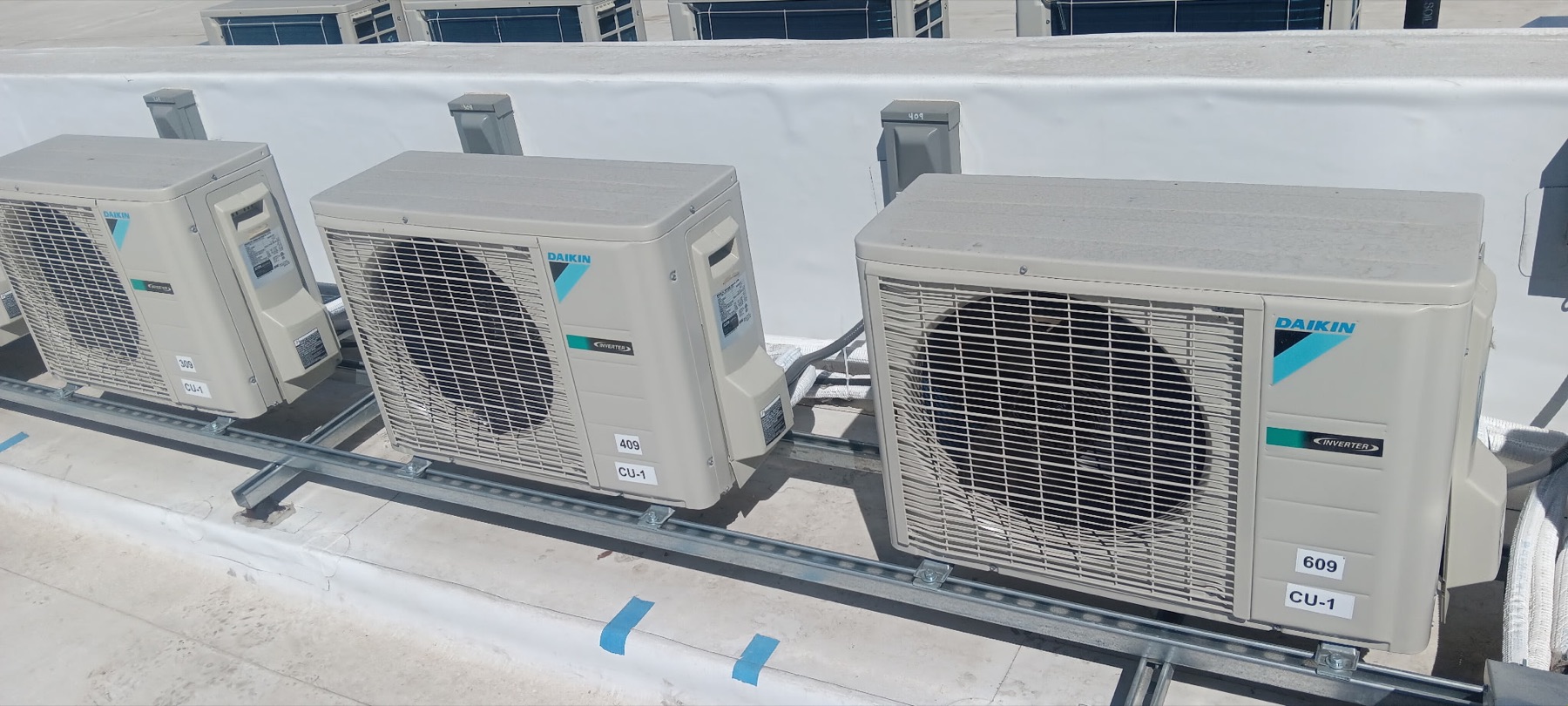 Rooftop equipment with adjacent electrical disconnects