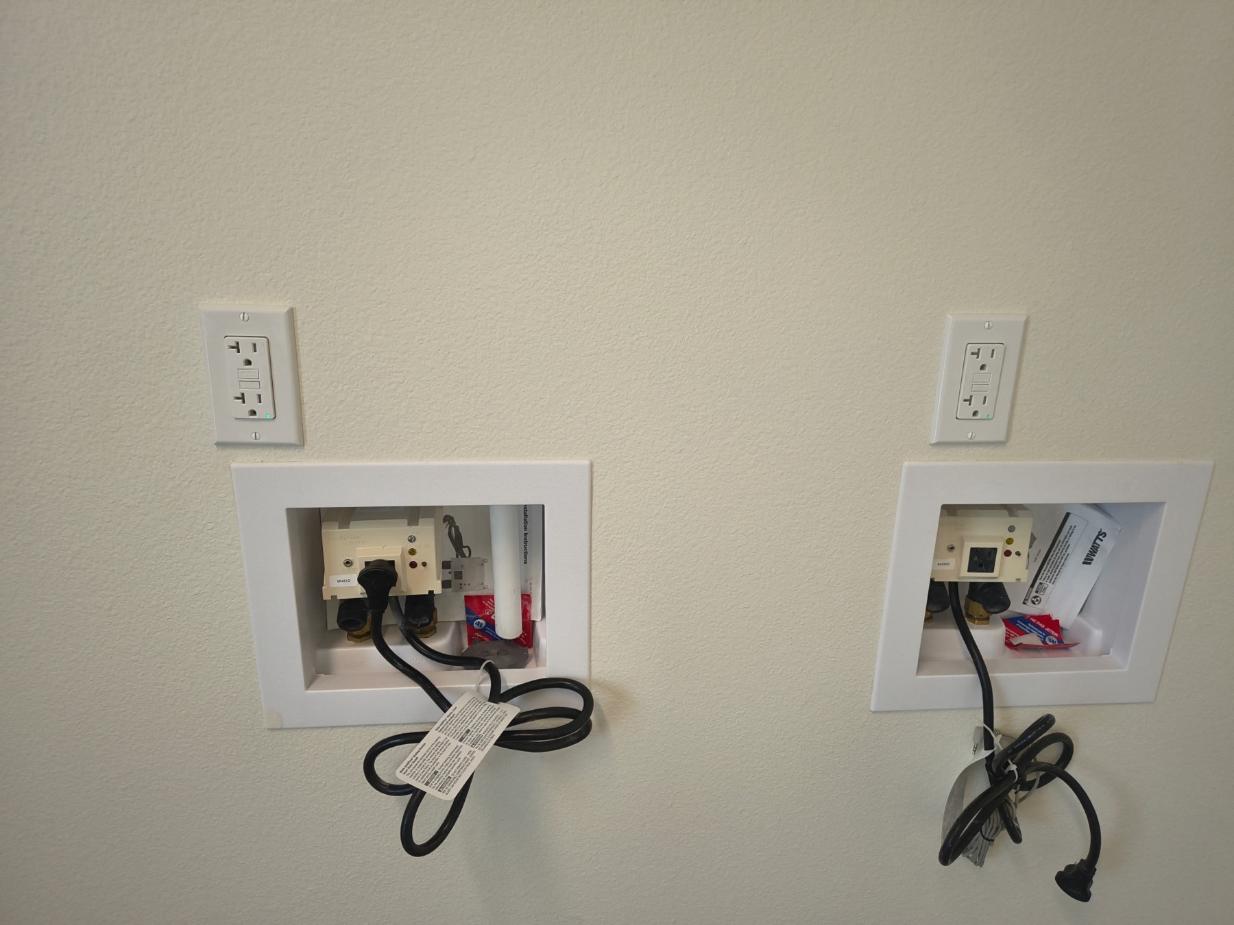 Electrical connections for laundry equipment and an automatic water control system
