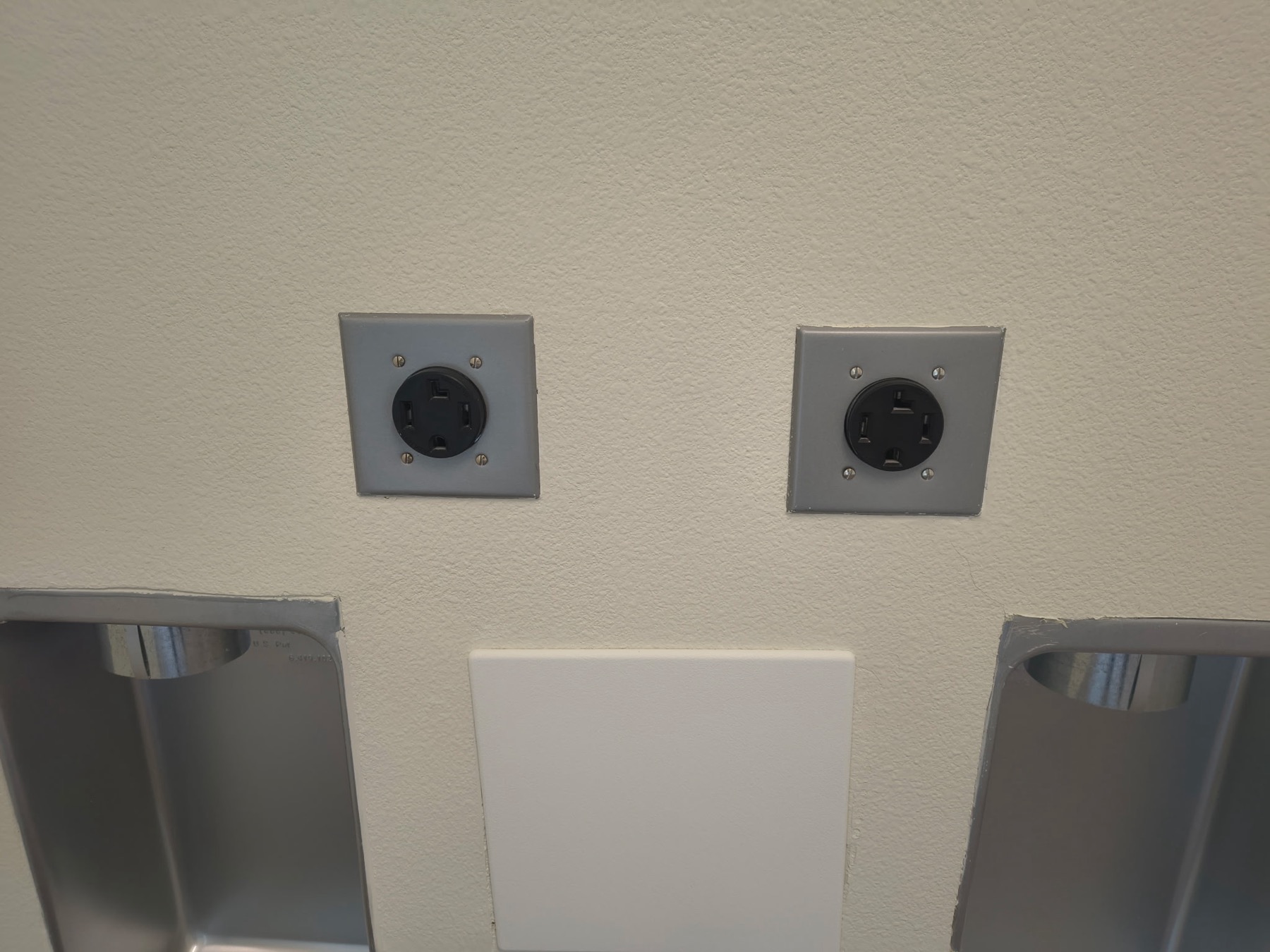 Electrical receptacles installed for shared laundry equipment